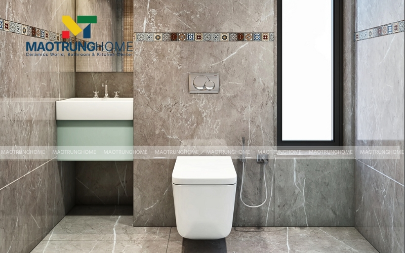 Nhà vệ sinh nhỏ phong cách tối giản sử dụng gạch vân đá màu xám