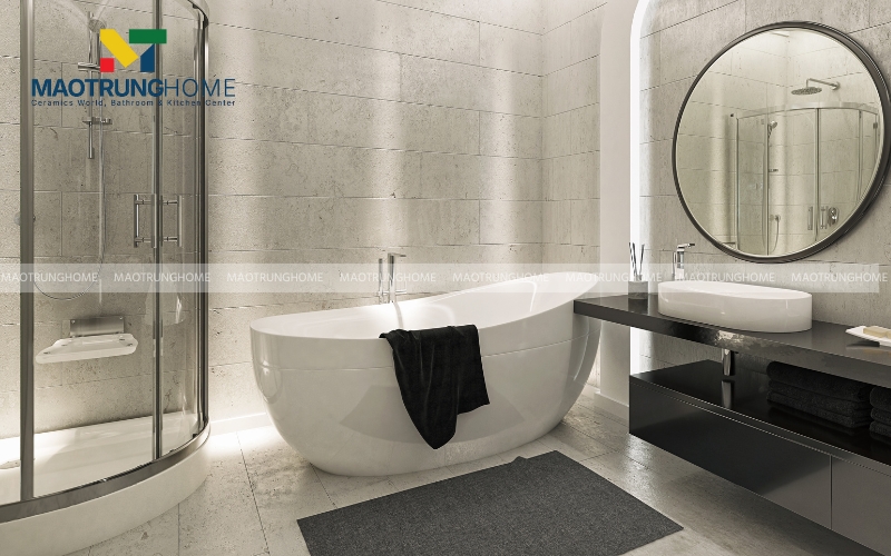 Phòng tắm sử dụng vách kính để ngăn khu vực tắm đứng và bồn tắm