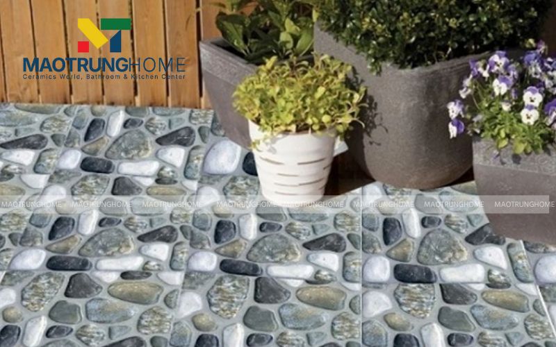 Gạch giả sỏi 40x40 tạo vẻ đẹp mộc mạc và gần gũi cho lối đi