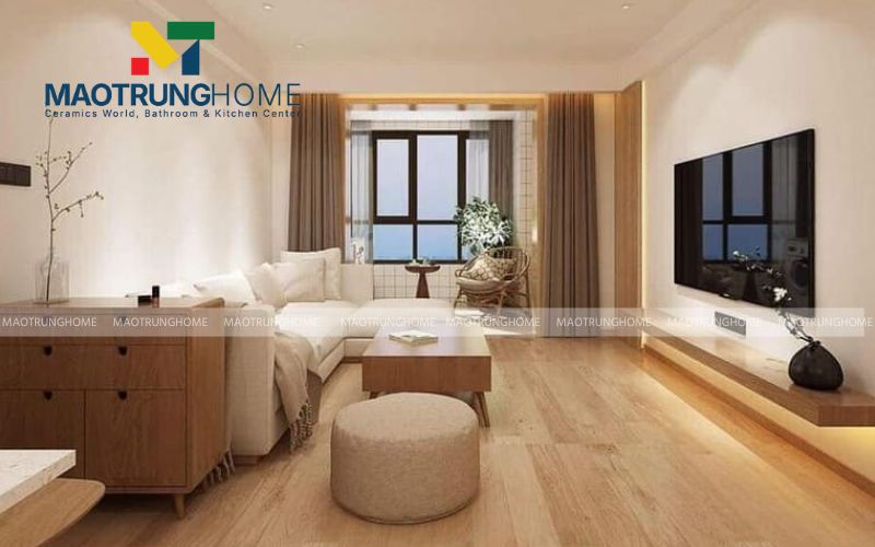 Gạch vân gỗ cao cấp tạo nên sự liền mạch và ấm cúng cho toàn bộ phòng khách.
