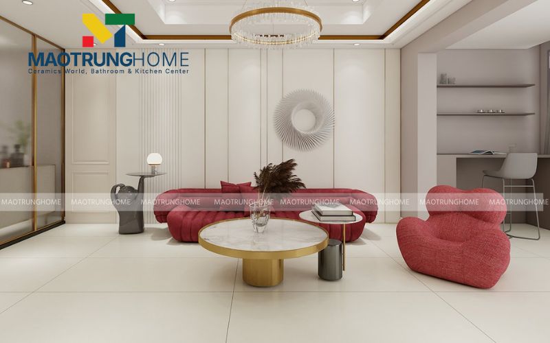 Gạch vân đá trắng kết hợp nội thất màu nổi bật tạo điểm nhấn cho phòng khách.