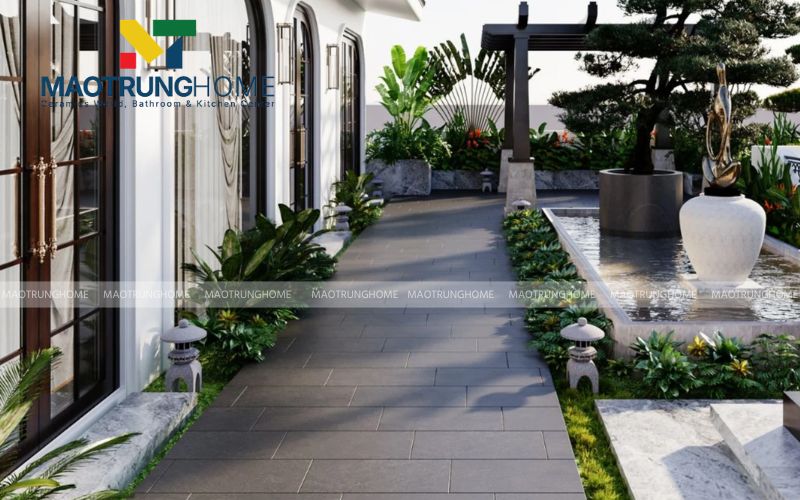 Gạch terrazzo vân đá màu tối tạo điểm nhấn đẳng cấp cho lối đi biệt thự phố.