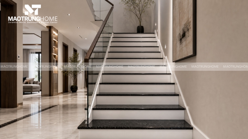 Cầu thang phối hợp mặt bậc đá Granite đen và cổ bậc nhân tạo trắng